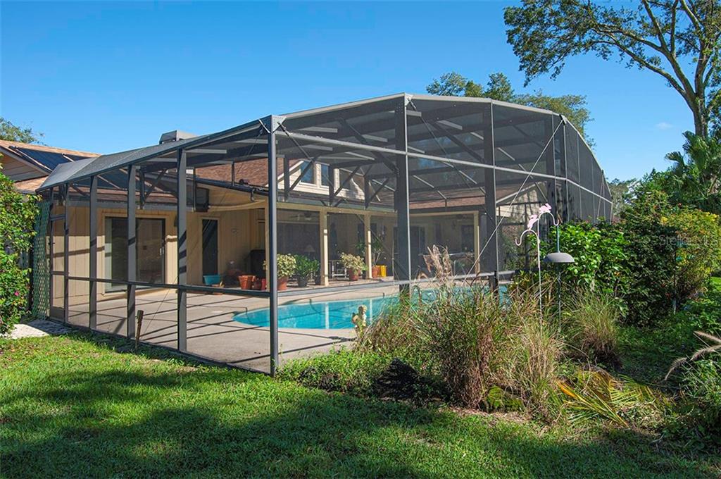 145 Spring Chase Circle Altamonte Springs, FL 32714 - Photo 44 of 54 Screened pool with lots of deck space for all your fun activities!