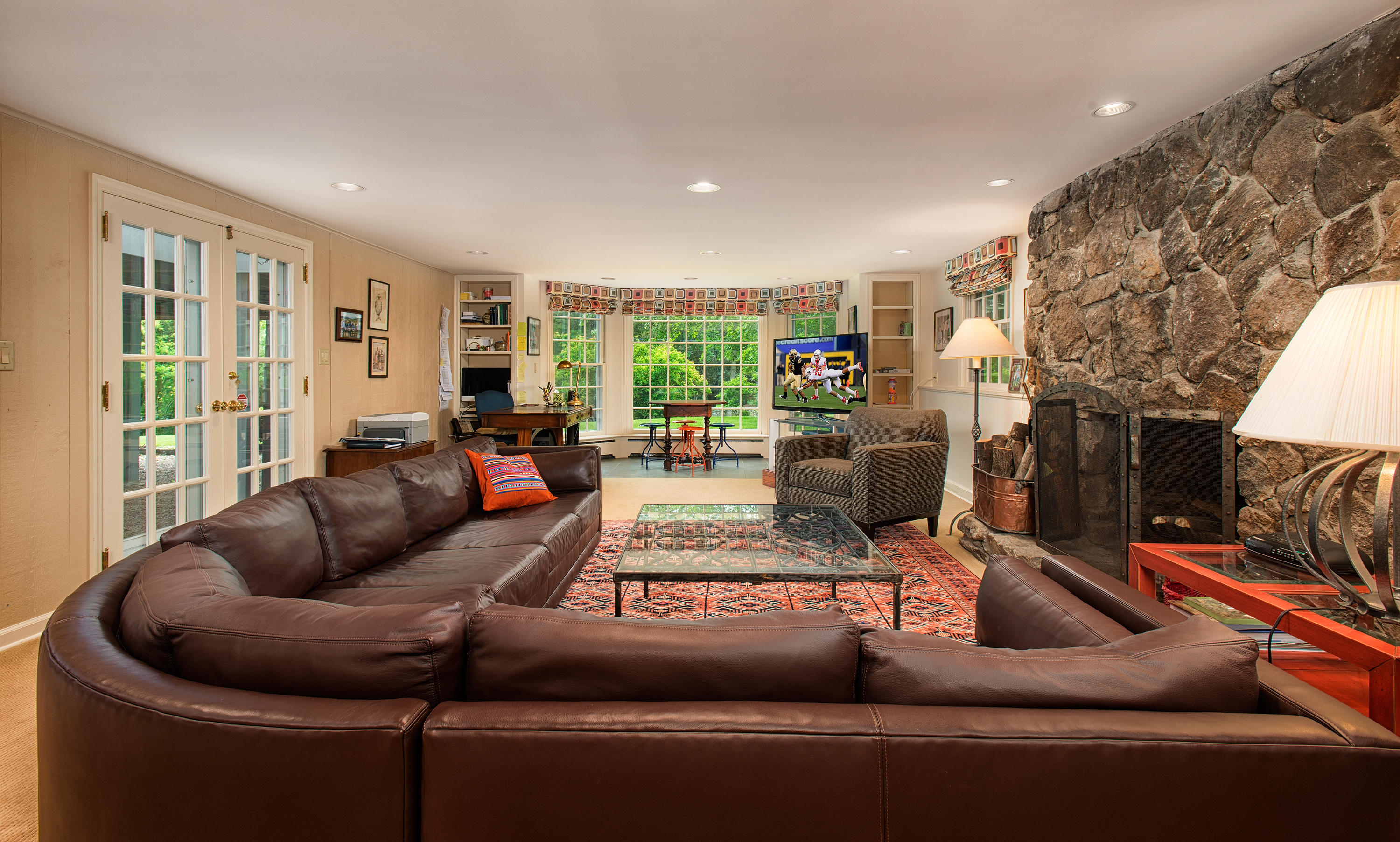 314 Brushy Ridge Road New Canaan, CT 06840 - Photo 11 of 23 a living room with furniture and a large window