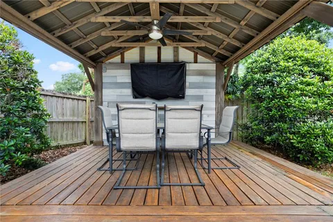 a view of balcony with wooden floor