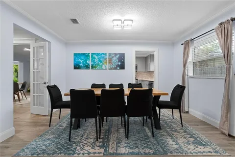 a view of a dining room with furniture