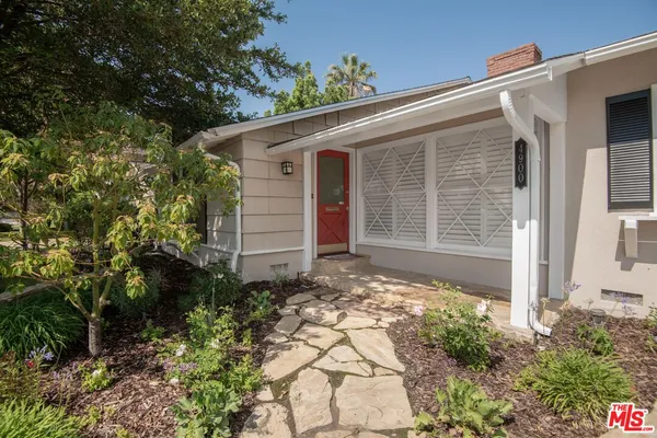 a front view of house with yard