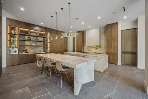 a bed room with a bed window and a flat tv screen