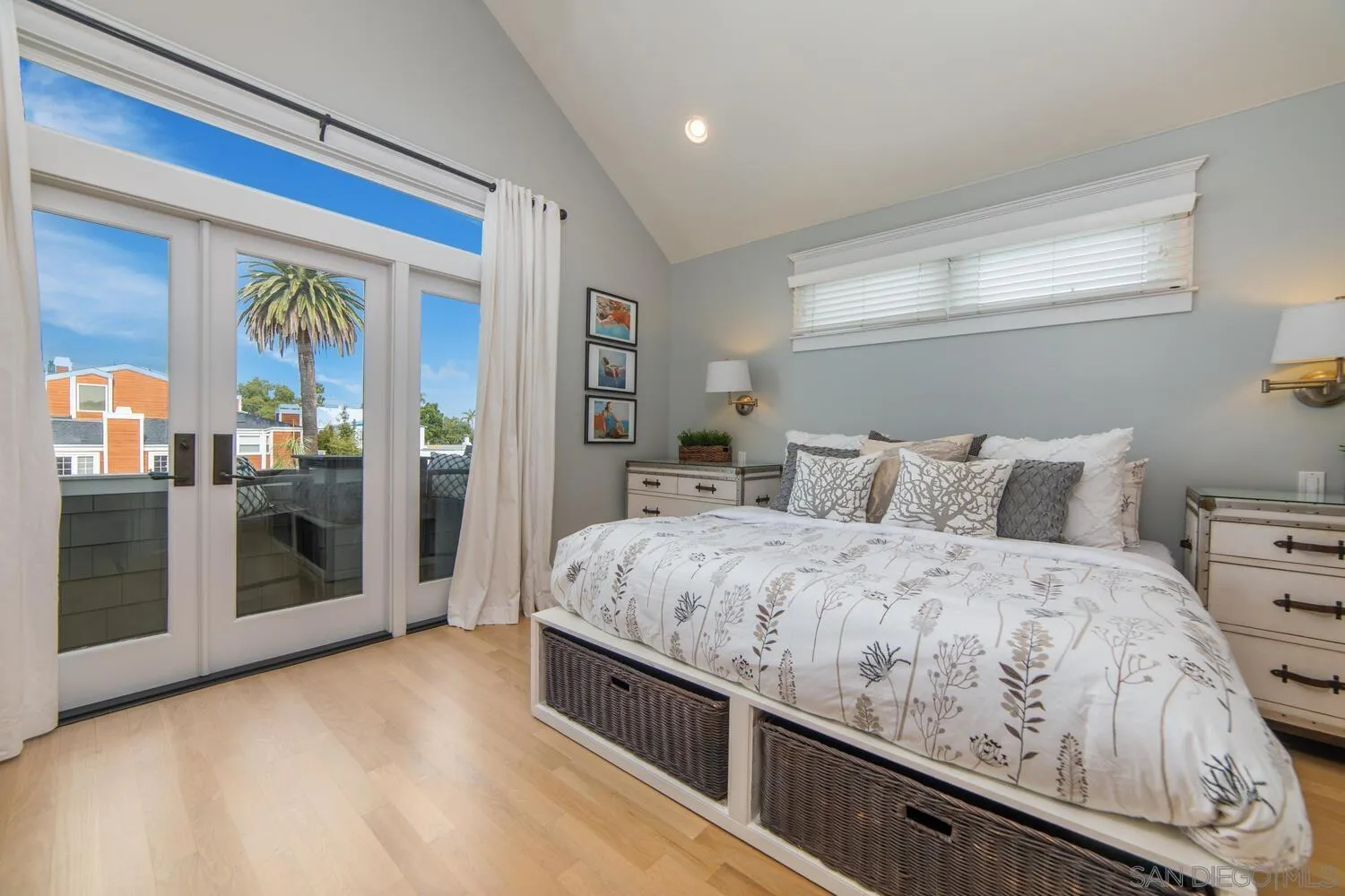 717 G Avenue Coronado, CA 92118 - Photo 15 of 33 a spacious bedroom with a bed and walk in closet