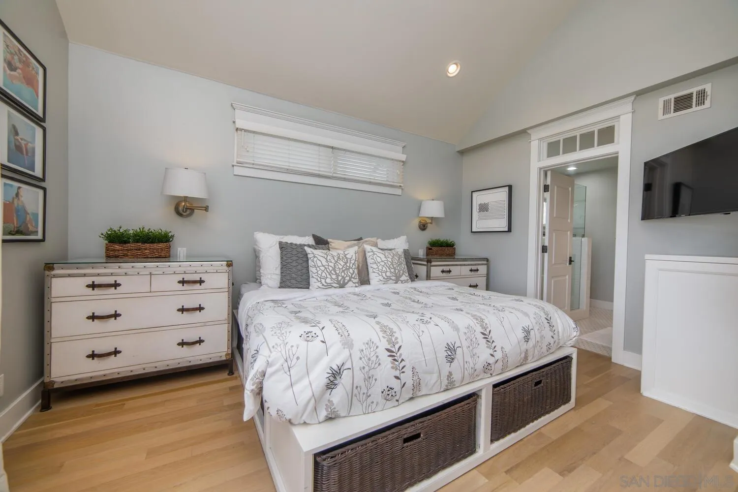 717 G Avenue Coronado, CA 92118 - Photo 16 of 33 a bedroom with a bed and a flat screen tv