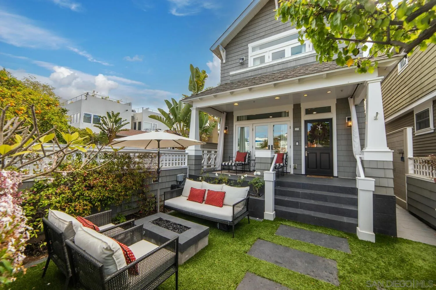 717 G Avenue Coronado, CA 92118 - Photo 2 of 33 a view of a house with a backyard and sitting area