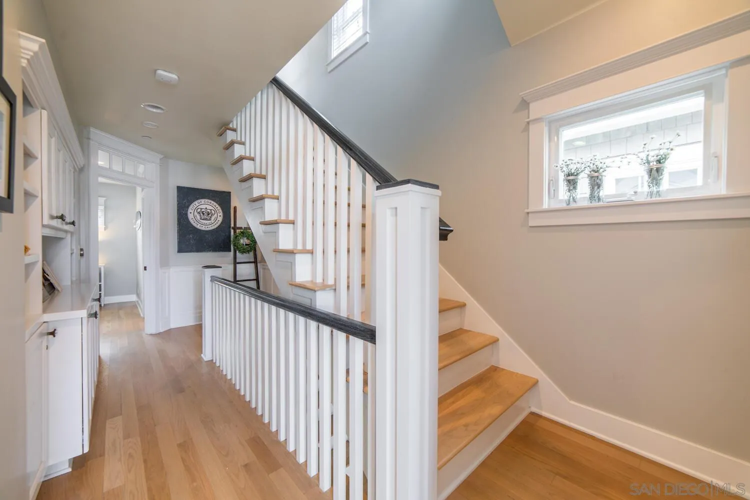 717 G Avenue Coronado, CA 92118 - Photo 21 of 33 a view of a hallway with windows