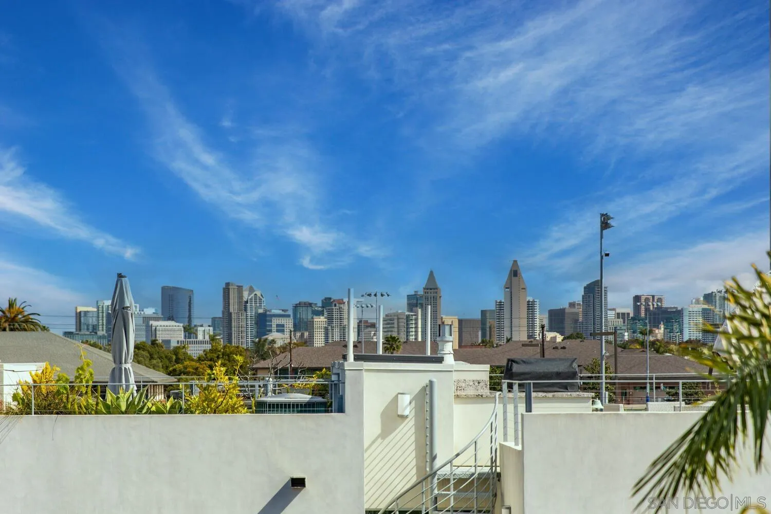 717 G Avenue Coronado, CA 92118 - Photo 26 of 33 a view of a city with tall buildings