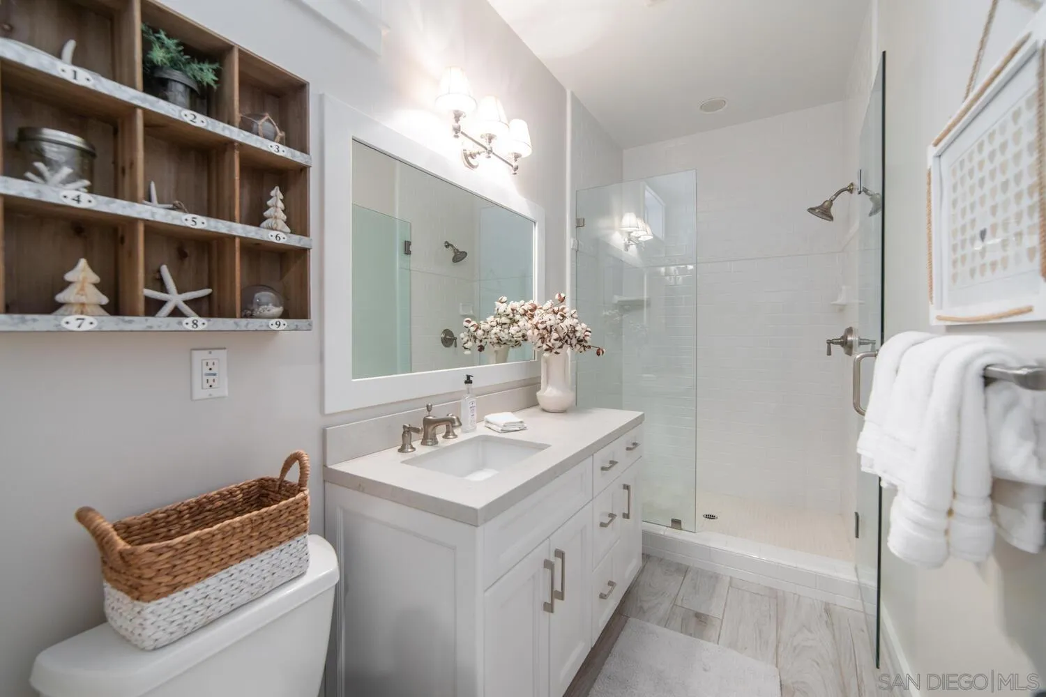 717 G Avenue Coronado, CA 92118 - Photo 29 of 33 a bathroom with a sink toilet and shower