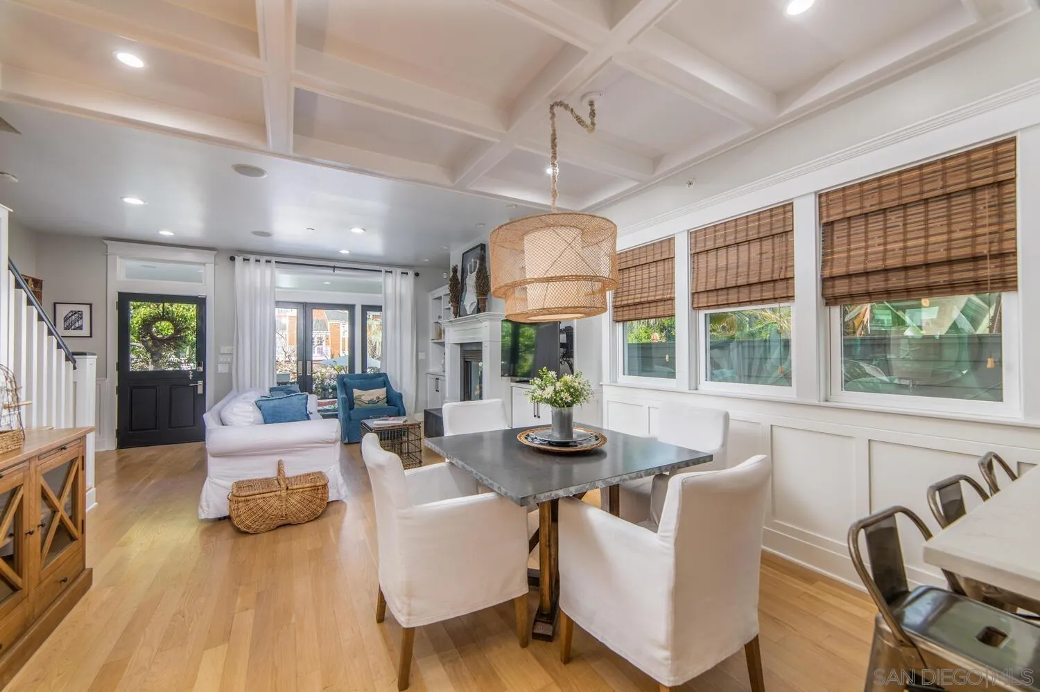 717 G Avenue Coronado, CA 92118 - Photo 6 of 33 a living room with fireplace furniture and a large window