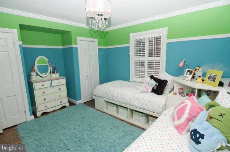 105 Goodale Road Baltimore, MD 21212 - Photo 19 of 27 a bedroom with a bed and a dresser