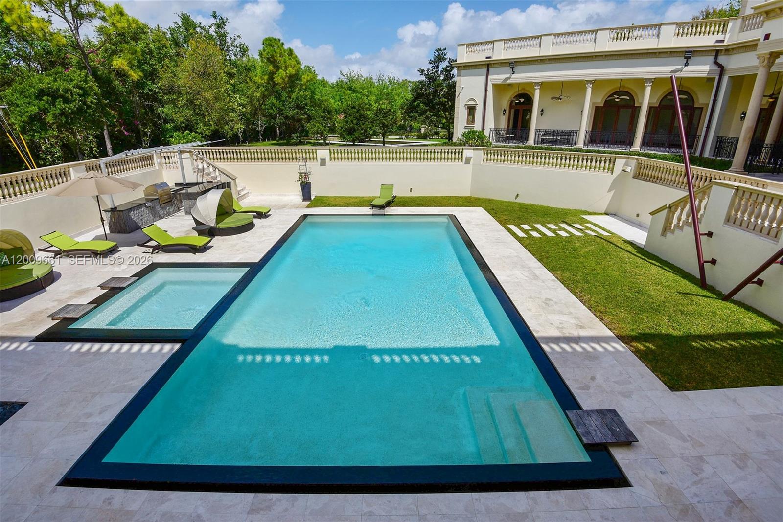 5801 Moss Ranch Road Pinecrest, FL 33156 - Photo 30 of 32 a view of swimming pool with a sitting area
