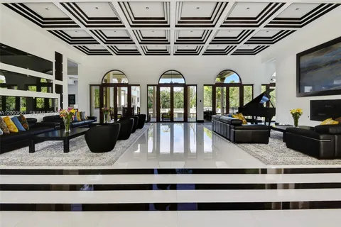 a living room with furniture or couch and a flat screen tv