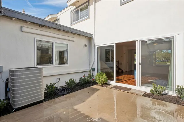 a view of a lake with a house in the background