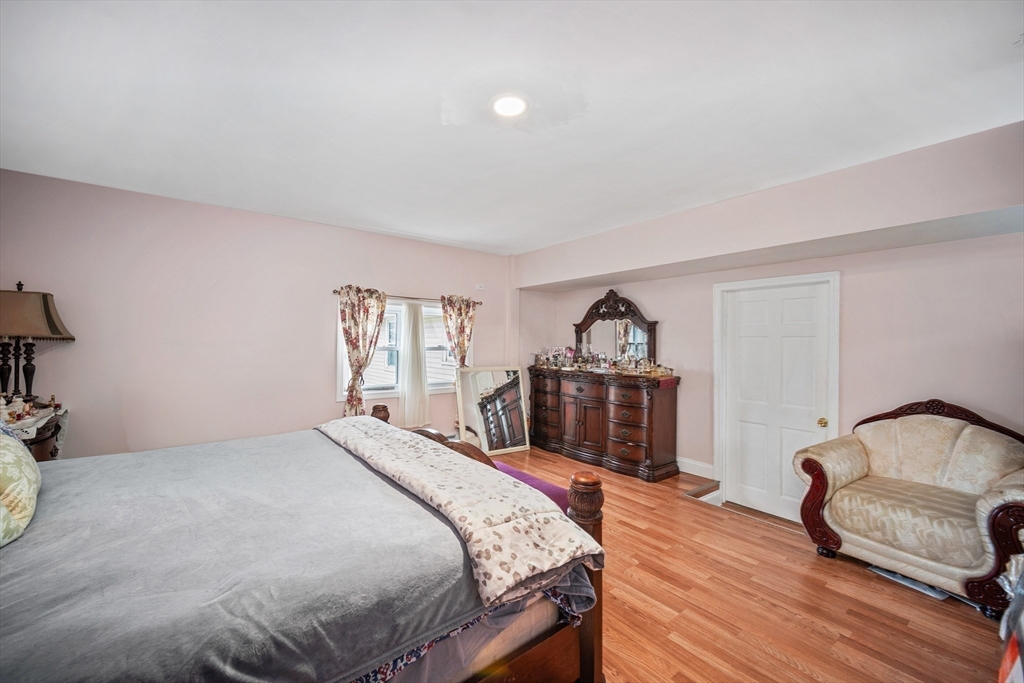 12 Dodge Road Brockton, MA 02302 - Photo 11 of 18 a bedroom with a bed and a dresser