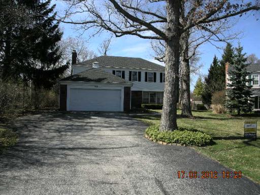 100 Indian Road Lake Bluff, IL 60044 - Photo 1 of 9 a front view of a house with a yard