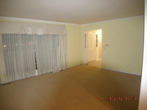 100 Indian Road Lake Bluff, IL 60044 - Photo 6 of 9 a view of a room with an empty space and a window