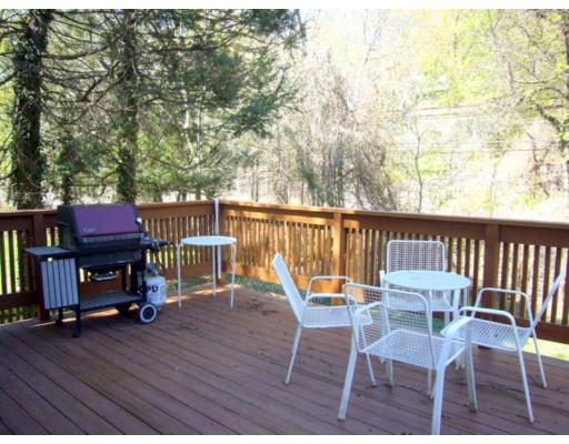 157 Clark Road Brookline, MA 02445 - Photo 3 of 21 a view of a chairs and table on the wooden floor