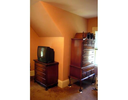 157 Clark Road Brookline, MA 02445 - Photo 9 of 21 a living room with furniture and a flat screen tv
