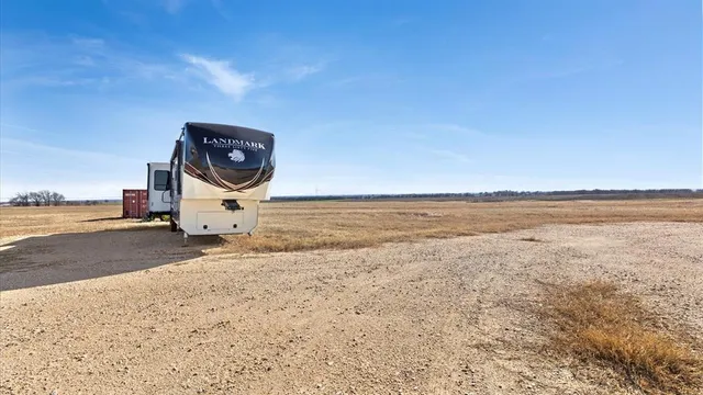 a bedroom with bed and window