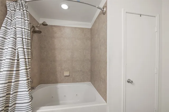 a bathroom with a bathtub