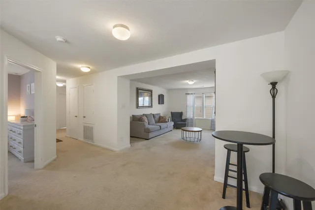 a view of a livingroom with furniture and a couch