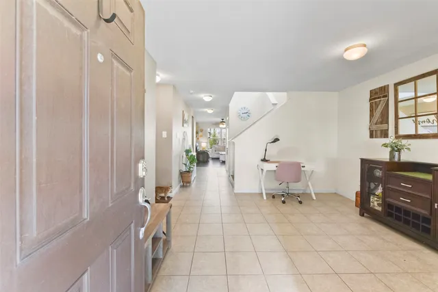 a living room with furniture and a table