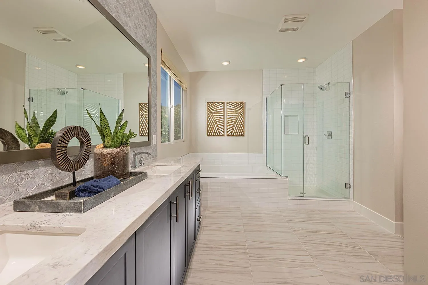 35310 Ponderosa Place Fallbrook, CA 92028 - Photo 7 of 7 a bathroom with a double vanity sink a mirror and a shower