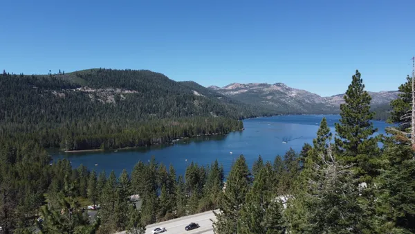 a view of a lake with mountains in the background
