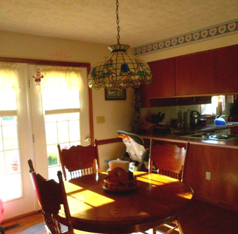 148 Millers Road Bridgewater, VA 22812 - Photo 10 of 20 a living room with dining table chairs and a potted plant