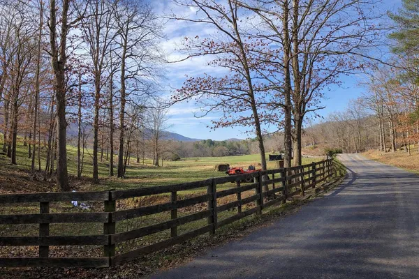 a view of a golf course with a lake