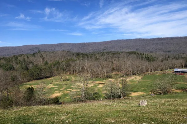 a view of lake with mountain
