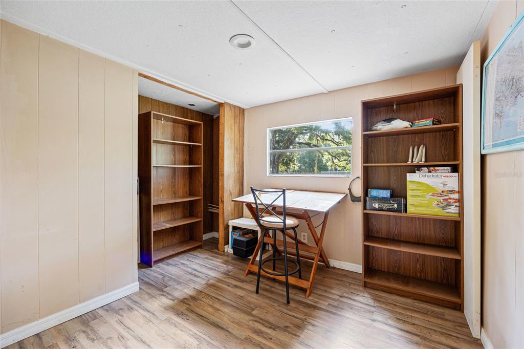 2780 County Road 575 Bushnell, FL 33513 - Photo 13 of 57 a room with furniture and a window