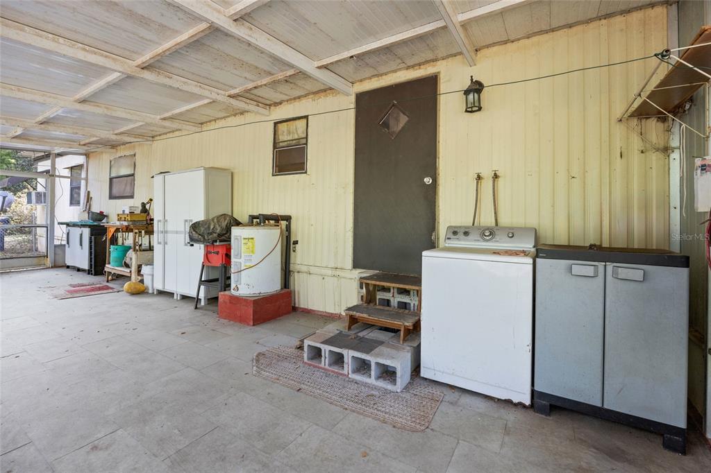 2780 County Road 575 Bushnell, FL 33513 - Photo 17 of 57 a room with storage and utility
