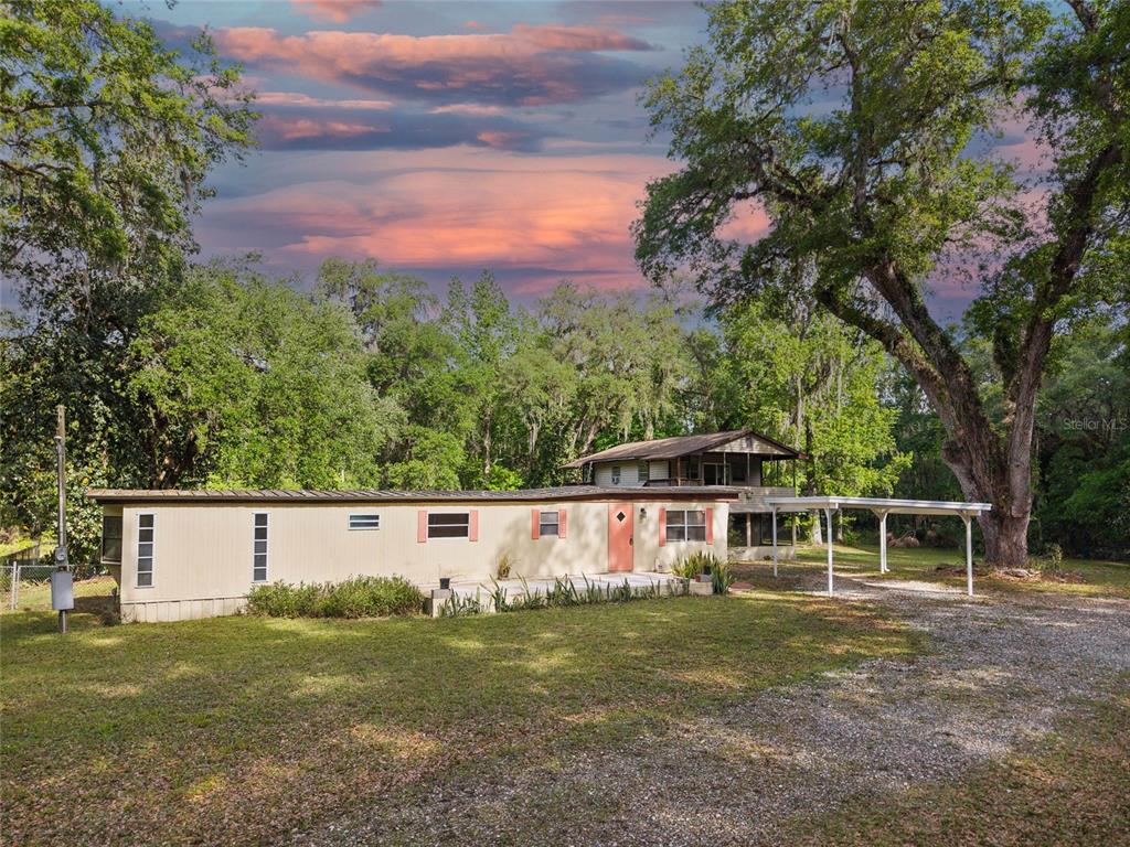 2780 County Road 575 Bushnell, FL 33513 - Photo 2 of 57 a view of a house with a yard