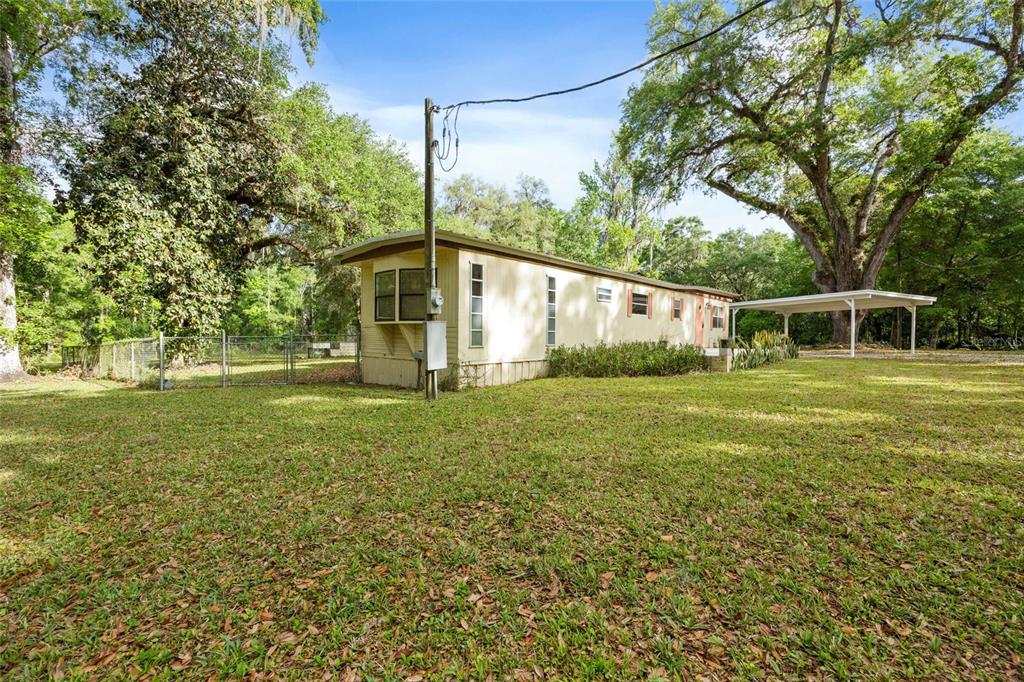 2780 County Road 575 Bushnell, FL 33513 - Photo 22 of 57 a view of backyard with green space