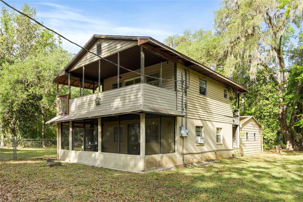 2780 County Road 575 Bushnell, FL 33513 - Photo 30 of 57 a front view of a house with a yard