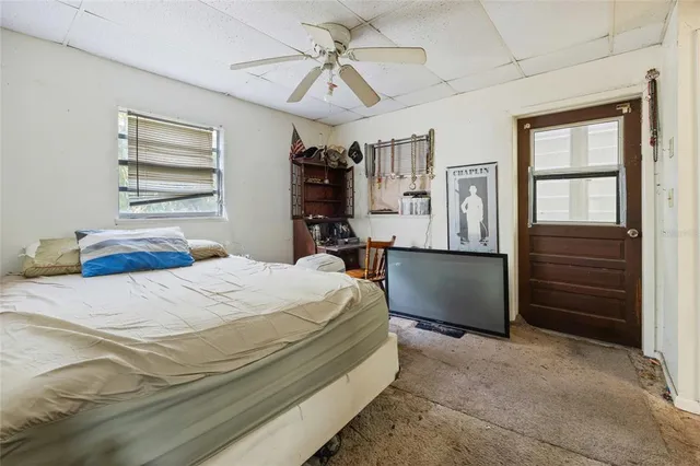 a view of a balcony with wooden floor and stairs