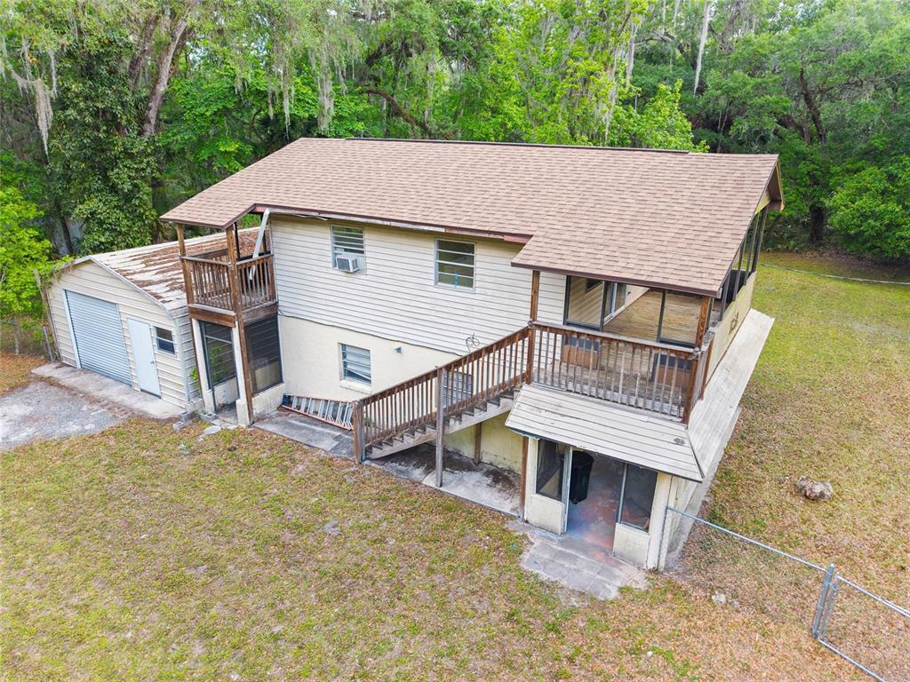 2780 County Road 575 Bushnell, FL 33513 - Photo 51 of 57 a aerial view of a house with a yard