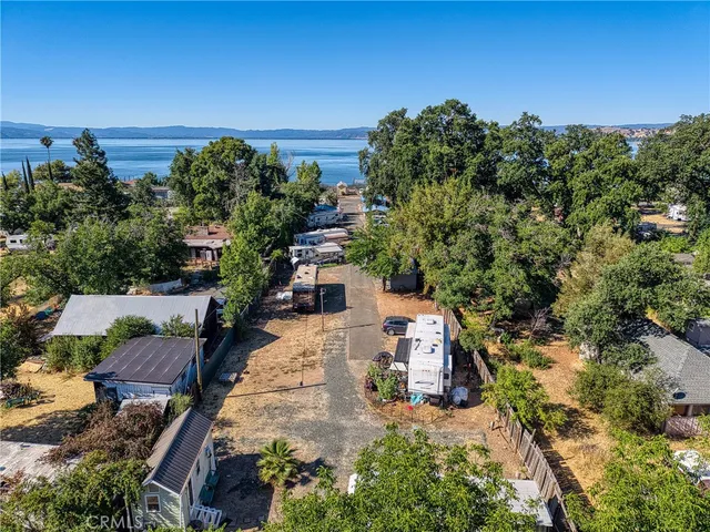 a room with pool table and wooden floor