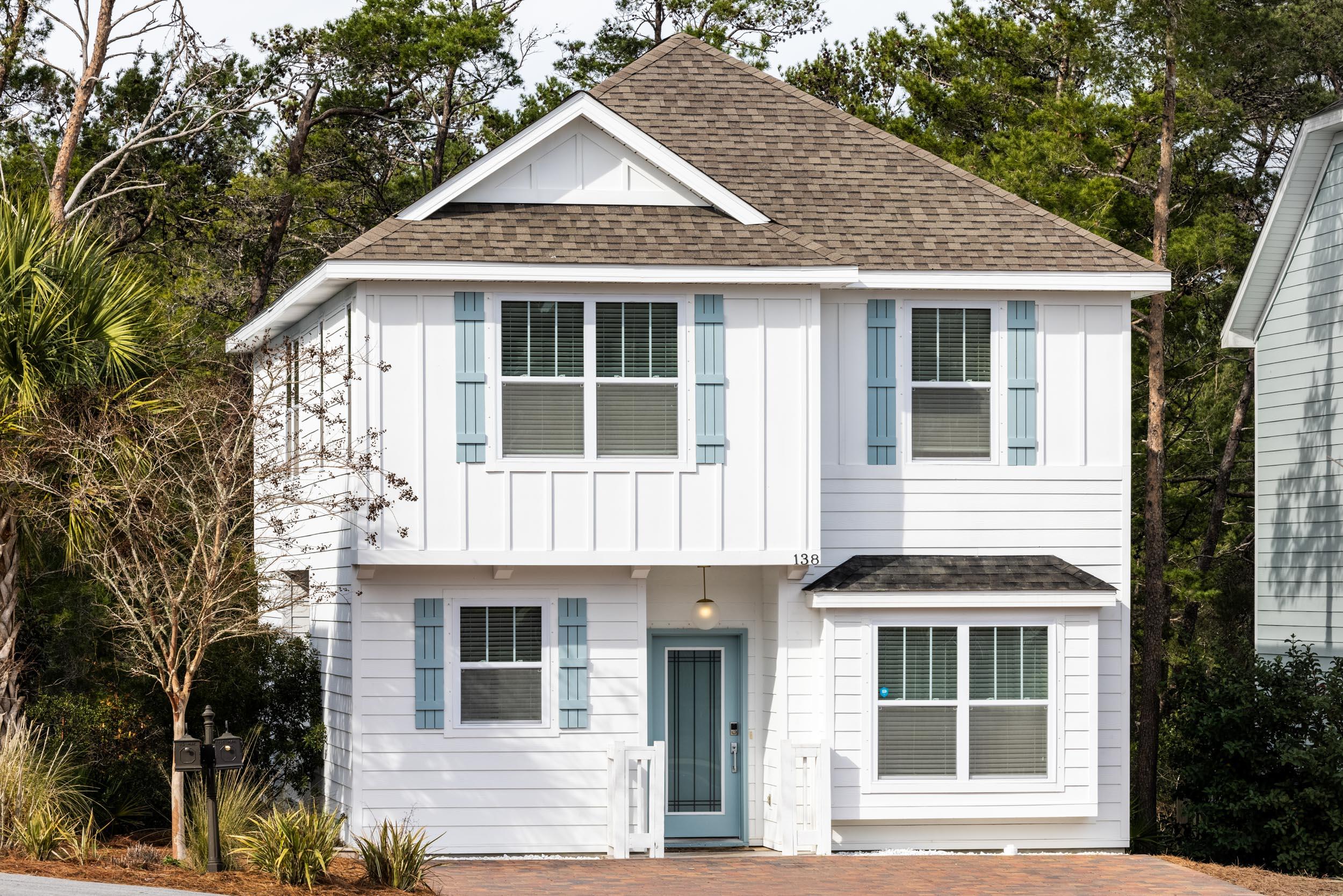138 Sandpine Loop Inlet Beach, FL 32461 - Photo 1 of 19 a front view of a house with a yard