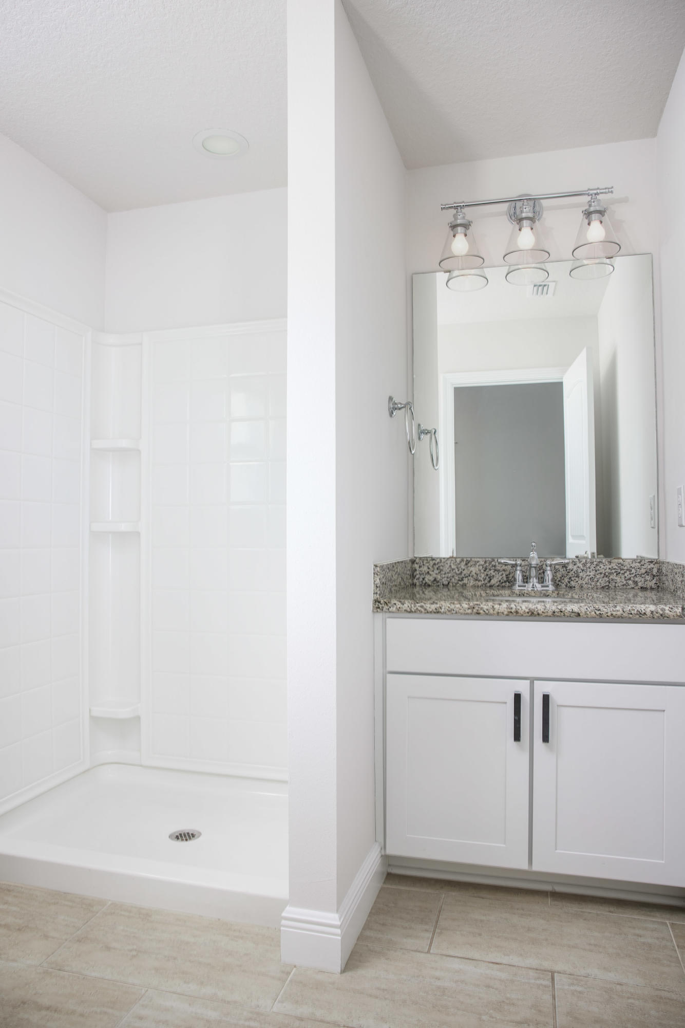 138 Sandpine Loop Inlet Beach, FL 32461 - Photo 13 of 19 a bathroom with a granite countertop sink a mirror and a bathtub