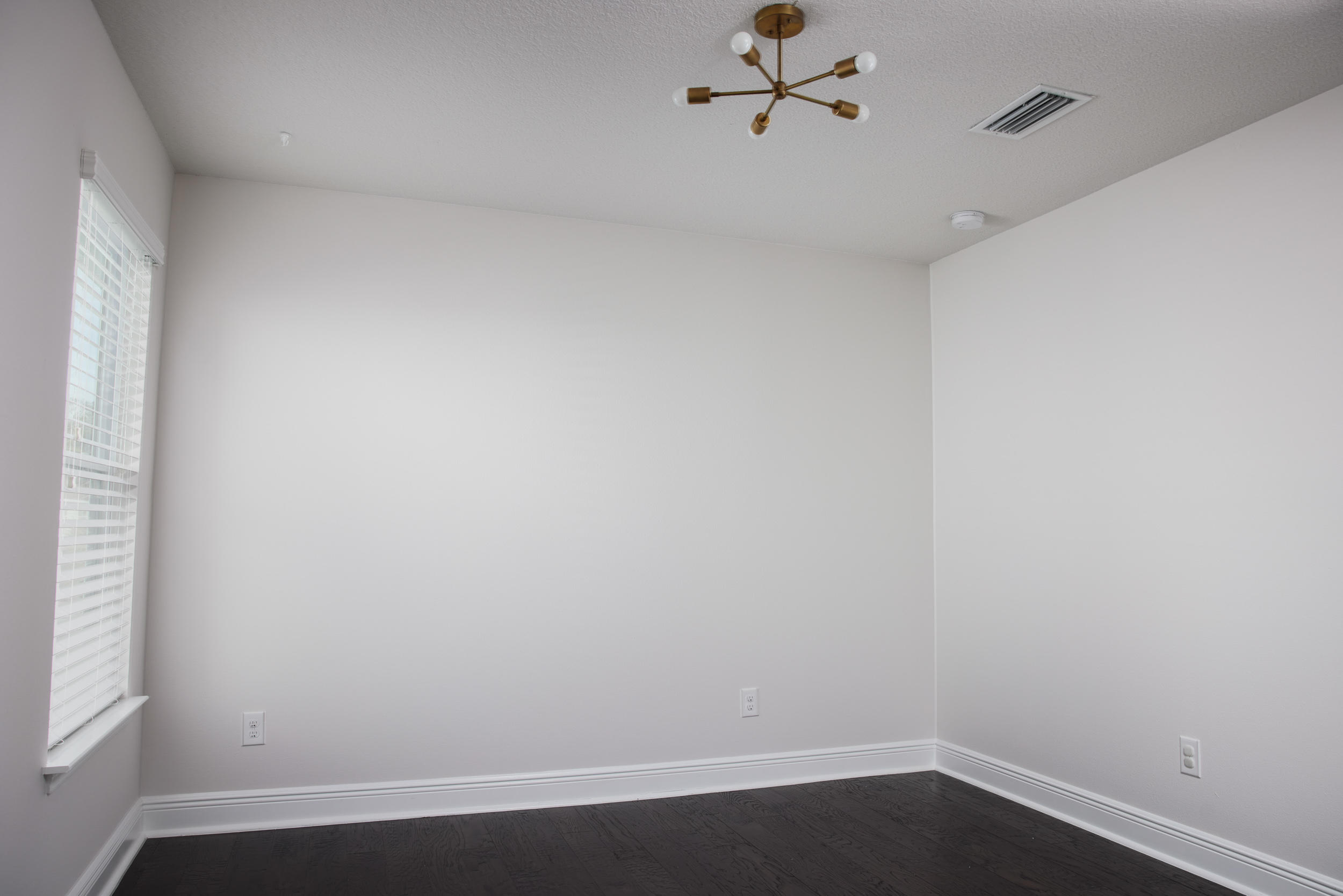138 Sandpine Loop Inlet Beach, FL 32461 - Photo 14 of 19 a view of a small space with wooden floor and a window