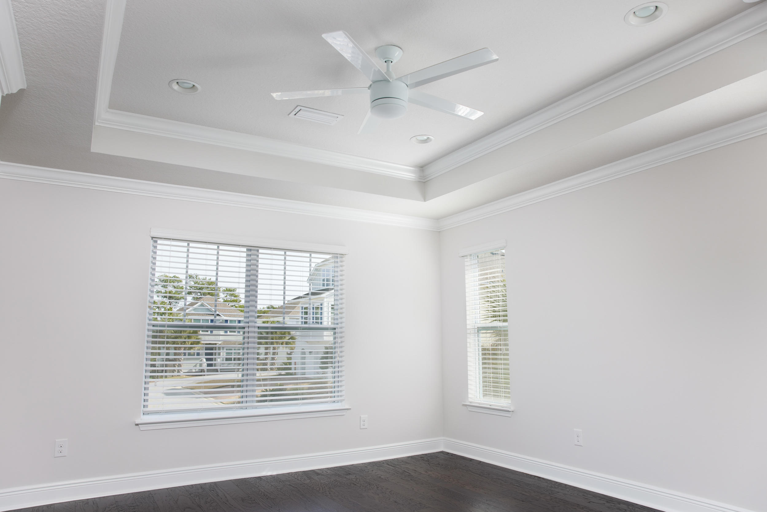 138 Sandpine Loop Inlet Beach, FL 32461 - Photo 15 of 19 a view of an empty room with a window and wooden floor