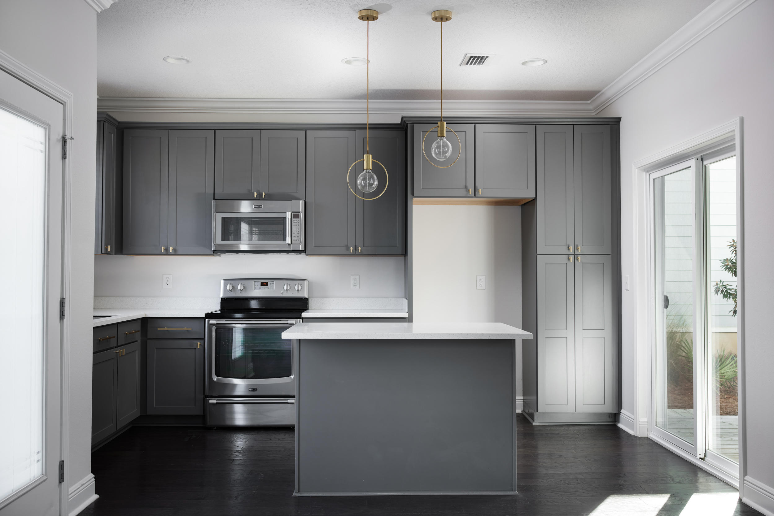 138 Sandpine Loop Inlet Beach, FL 32461 - Photo 2 of 19 a kitchen with stainless steel appliances a refrigerator and a stove