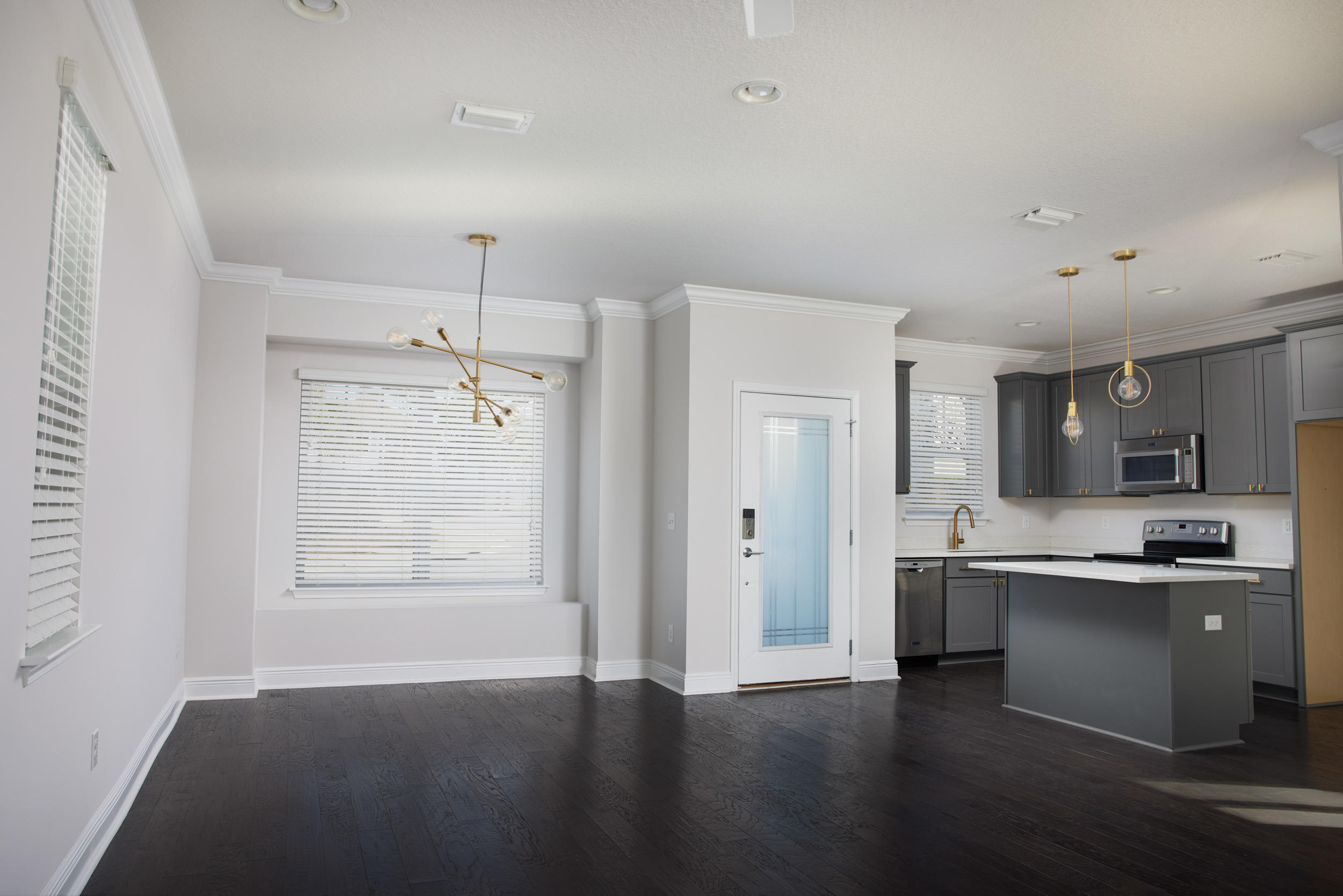 138 Sandpine Loop Inlet Beach, FL 32461 - Photo 5 of 19 a kitchen with stainless steel appliances granite countertop a sink stove and refrigerator