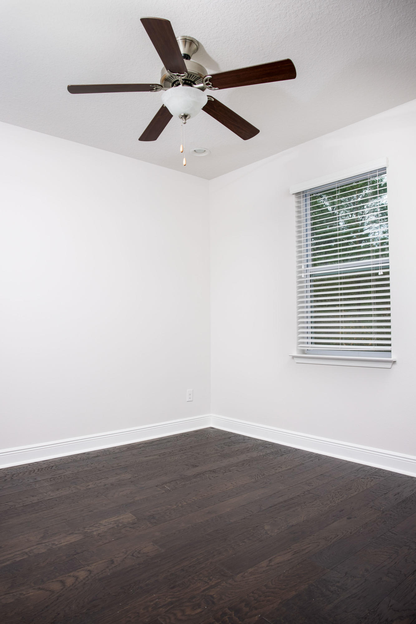 138 Sandpine Loop Inlet Beach, FL 32461 - Photo 9 of 19 a view of an empty room with wooden floor
