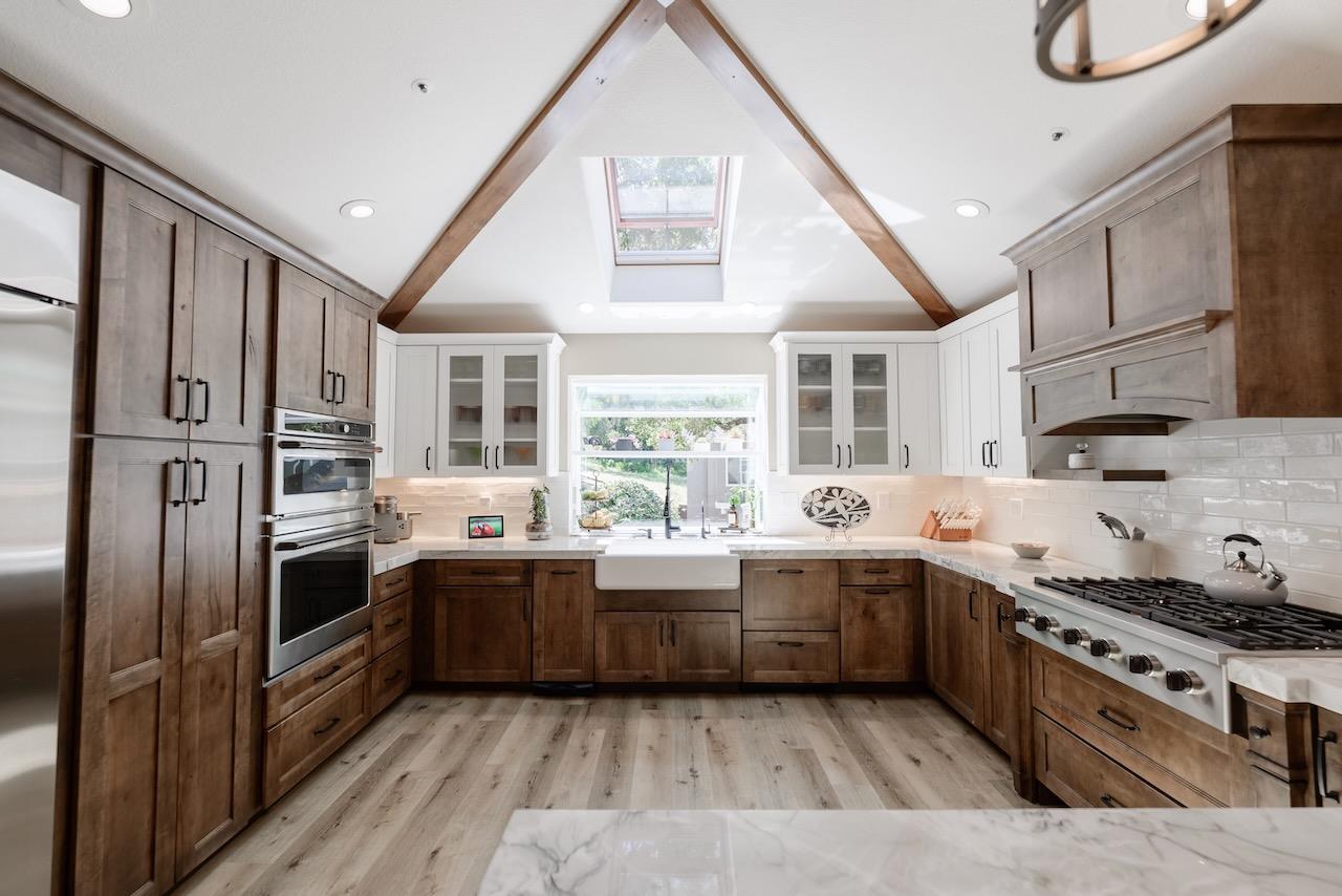 307 Sidesaddle Circle Scotts Valley, CA 95066 - Photo 13 of 116 a large kitchen with stainless steel appliances granite countertop a stove and a sink