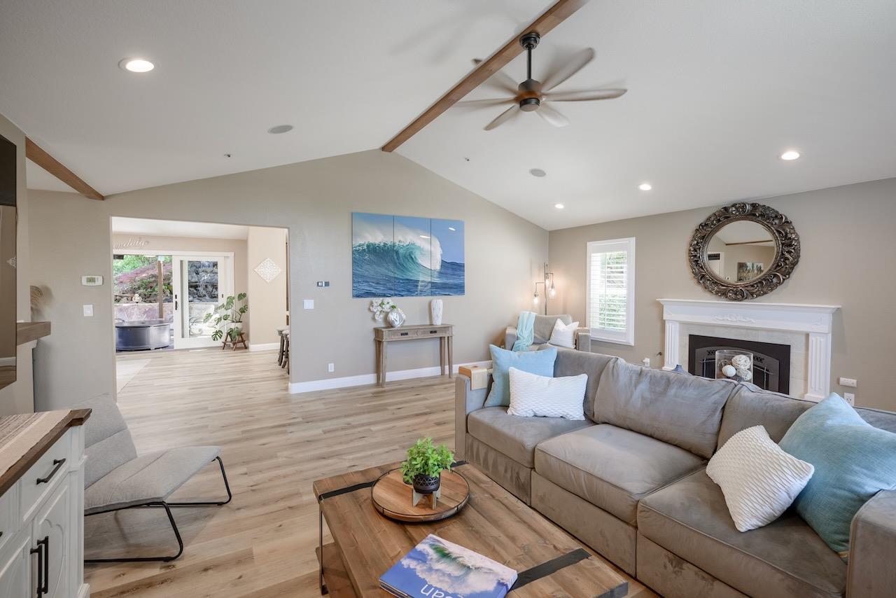 307 Sidesaddle Circle Scotts Valley, CA 95066 - Photo 32 of 116 a living room with furniture a large window and a clock