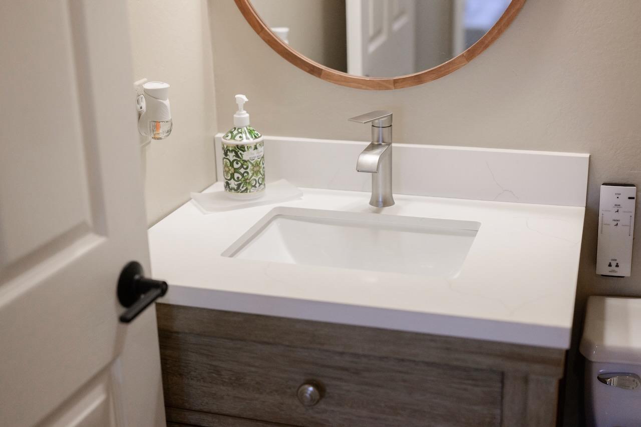 307 Sidesaddle Circle Scotts Valley, CA 95066 - Photo 36 of 116 a bathroom with a sink and a mirror