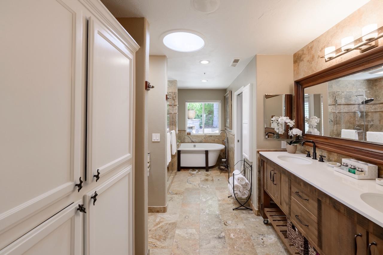 307 Sidesaddle Circle Scotts Valley, CA 95066 - Photo 45 of 116 a spacious bathroom with a double vanity sink a mirror and a bathtub